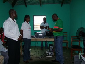 Norbert-handing-over-ICT-equipment-to-Loloto-Health-Centre-300x225